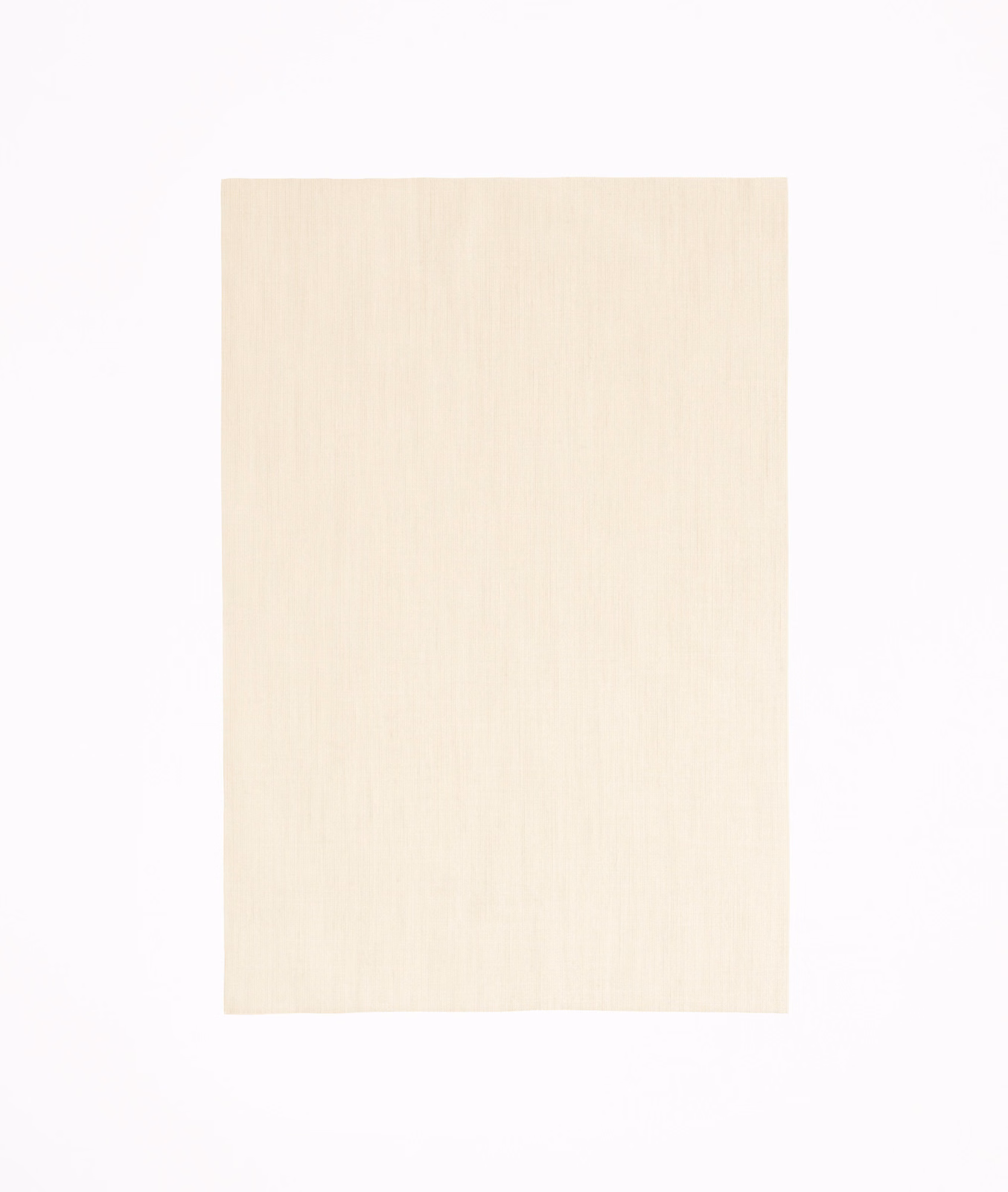 Pale quartz-rose fabric with fine vertical striations and a softly matte surface