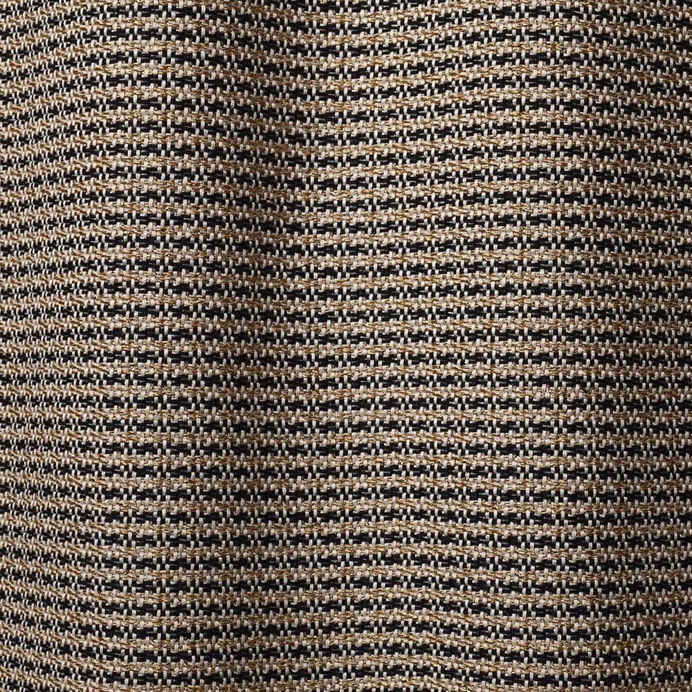 Black and muted gold woven textile showing broken bands and a small basket-like texture