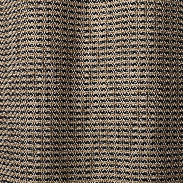 Black and muted gold woven textile showing broken bands and a small basket-like texture
