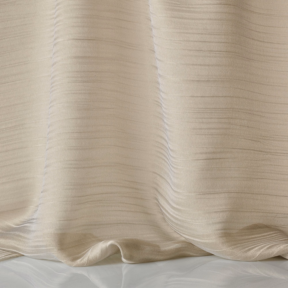 Warm champagne-beige fluid cloth with fine horizontal ripples in gathered folds