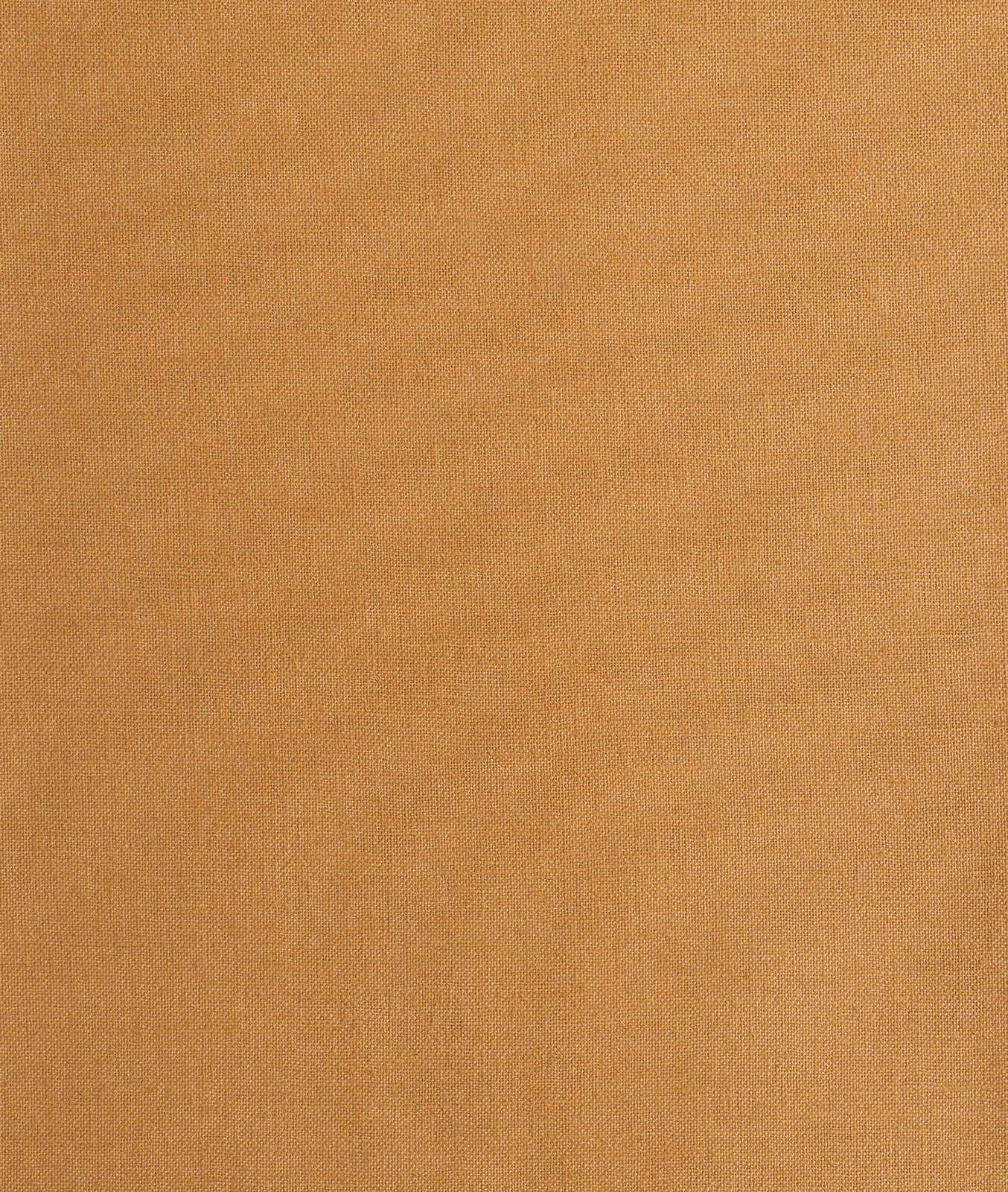 Close-up of warm amber plain weave with a fine, even textile texture