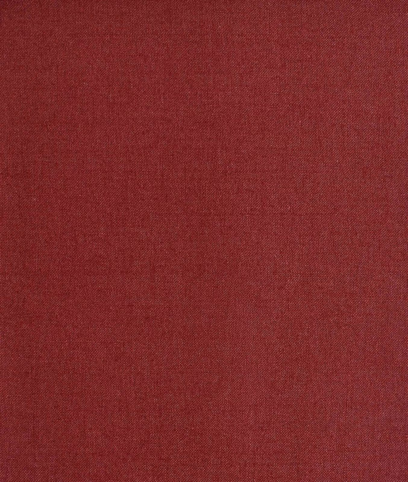Deep ciliegia red textile with a fine, subtly mottled plain weave