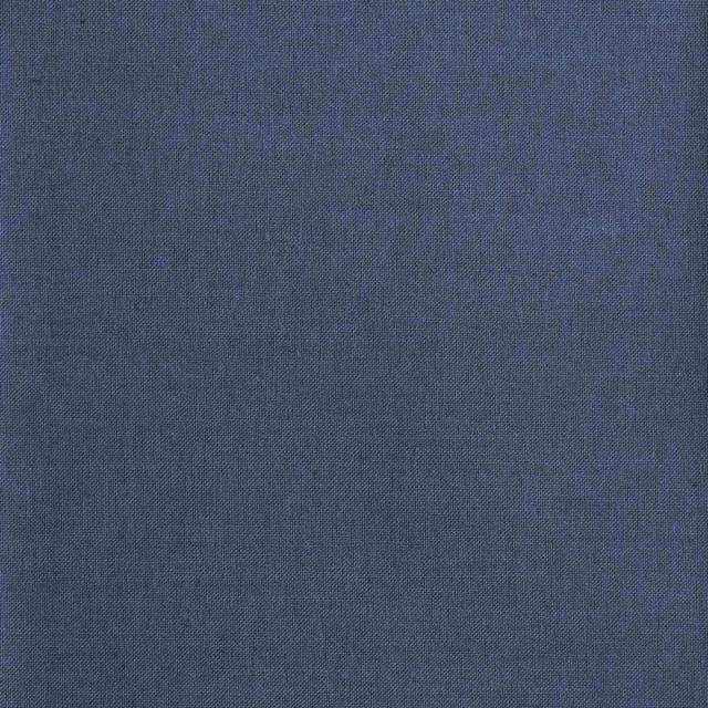 Close-up of muted slate-blue fabric with a fine, softly mottled woven texture