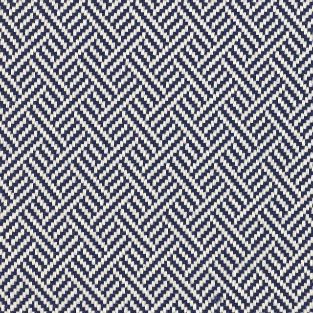 Close view of deep navy and cream woven chevrons with crisp zigzag texture