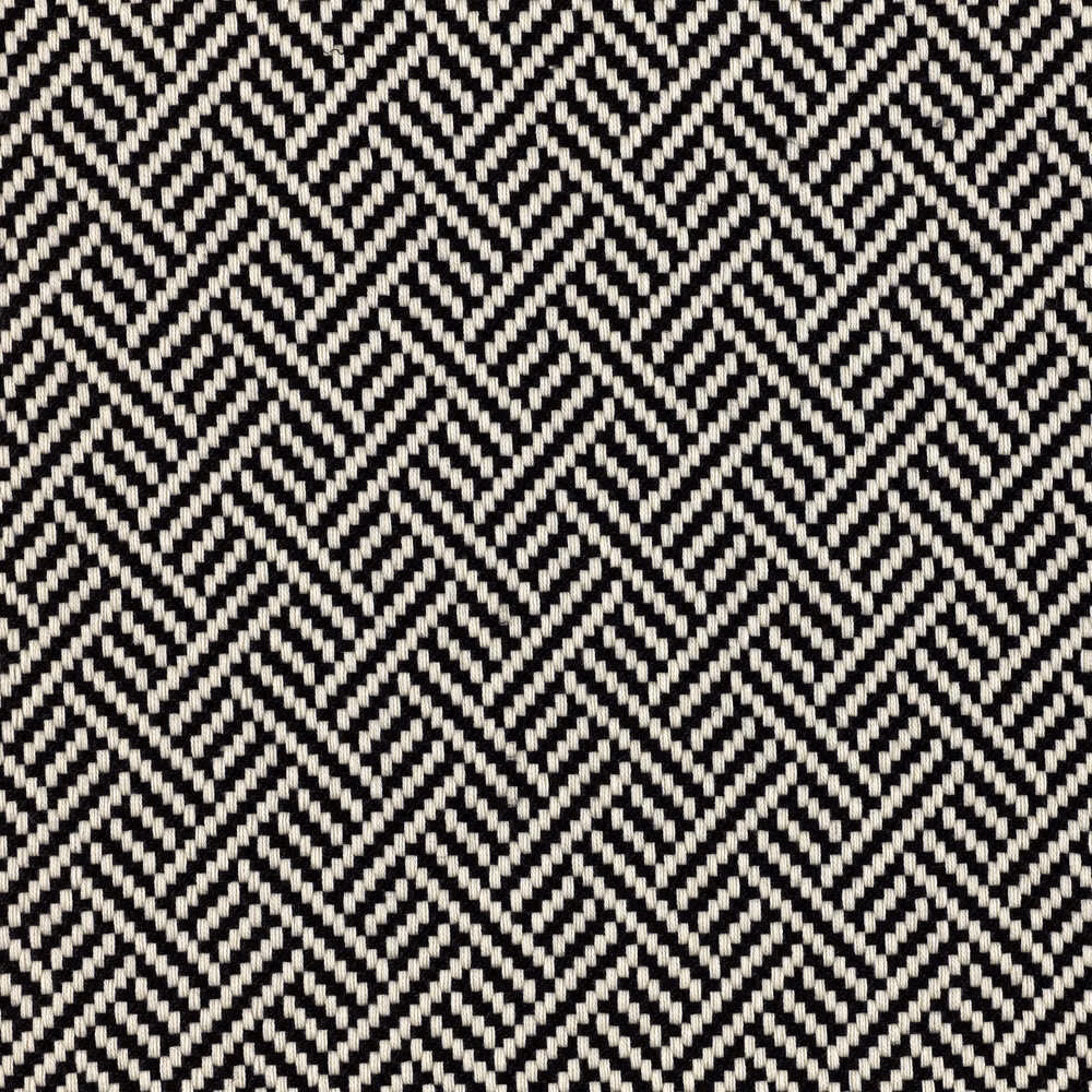 Black and ivory woven fabric with closely repeated geometric zigzag chevrons