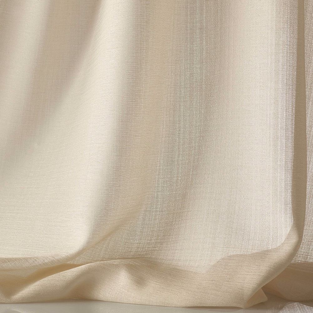 Warm cream sheer weave with fine vertical texture, softly gathered in folds