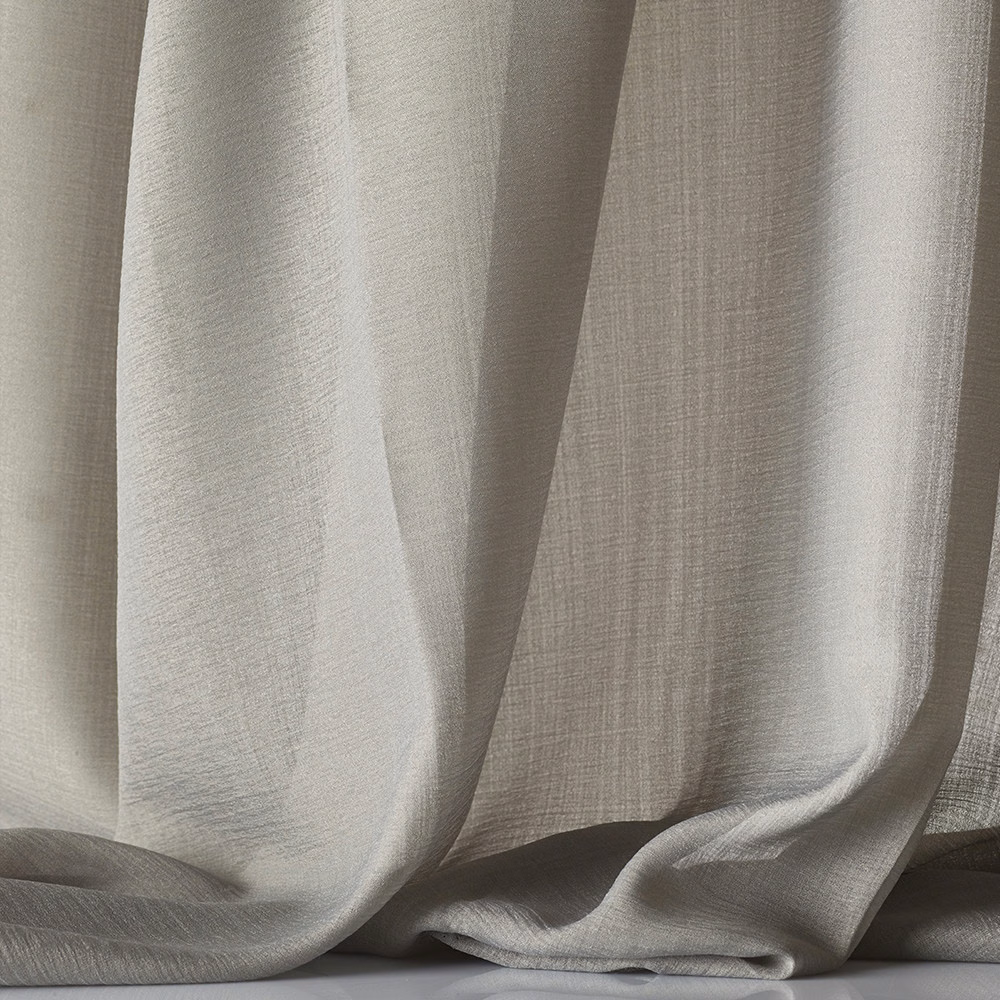 Pale greige sheer fabric in soft folds, showing a fine translucent cross-weave