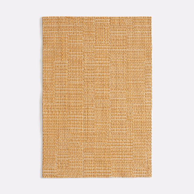 Amber-gold geometric woven fabric swatch with a tactile, variegated block texture