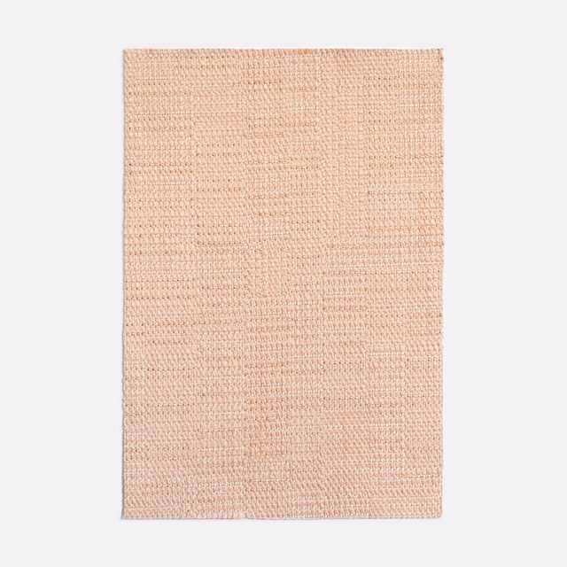 Pale blush rose fabric with fine, subtly ridged woven texture