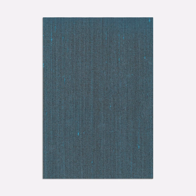Deep blue-teal woven fabric with fine vertical strié and bright teal flecks