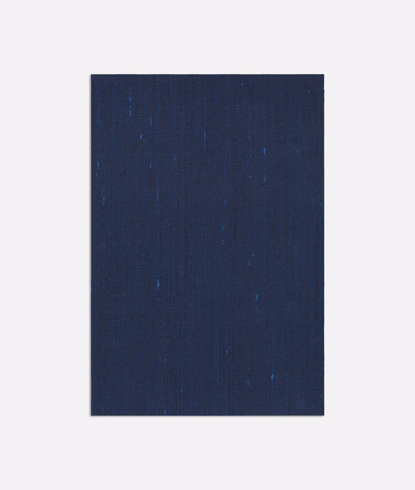 Deep navy woven swatch with fine vertical striations and scattered blue flecks