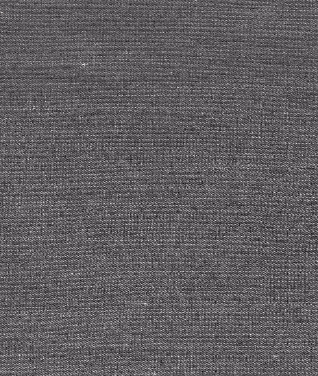 Deep charcoal fabric with fine horizontal striations and scattered pale slub flecks