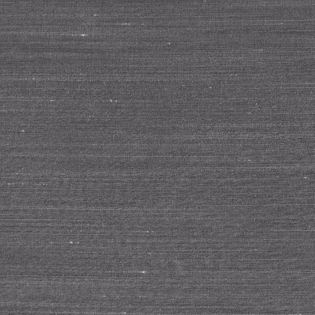 Deep charcoal fabric with fine horizontal striations and scattered pale slub flecks
