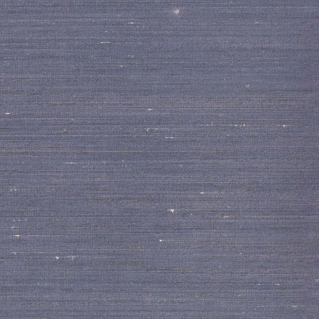 Muted slate-blue woven fabric with fine horizontal slubs and scattered pale flecks