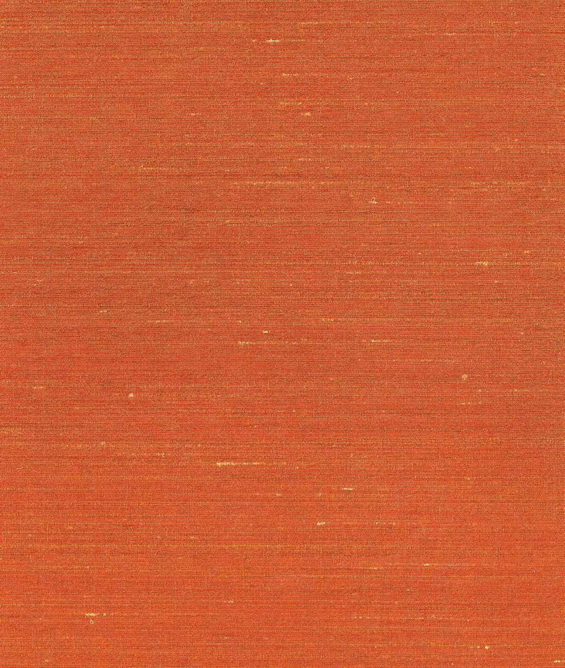 Warm terracotta-red woven swatch with fine horizontal slubbing and subtle golden flecks