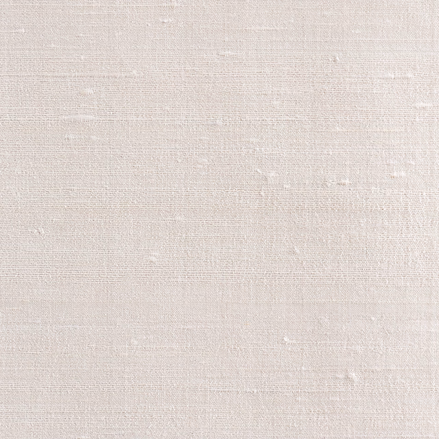Pale pearl ivory fabric with fine horizontal slubs and softly uneven woven bands
