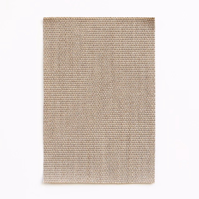 Pale pearl-beige fabric with a dense, small-scale looped woven texture