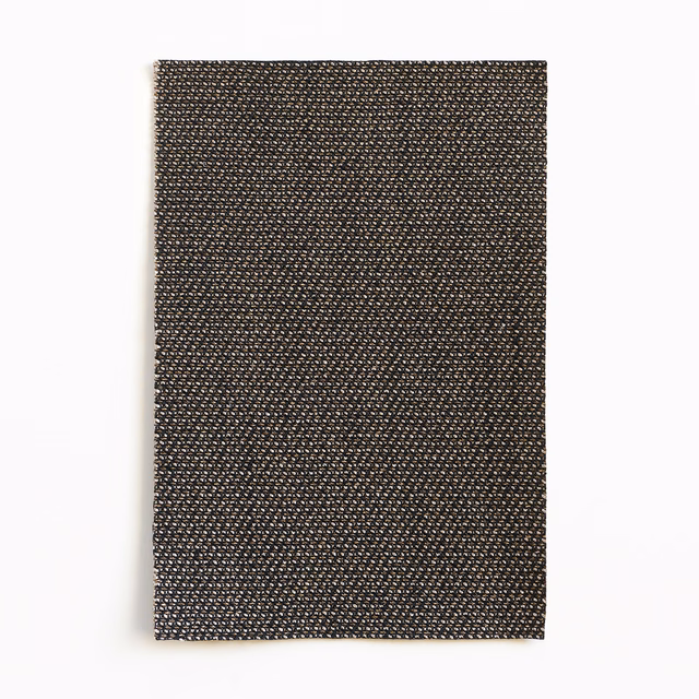 Deep espresso-brown textile with fine flecked diagonal weave and subtle tonal variation