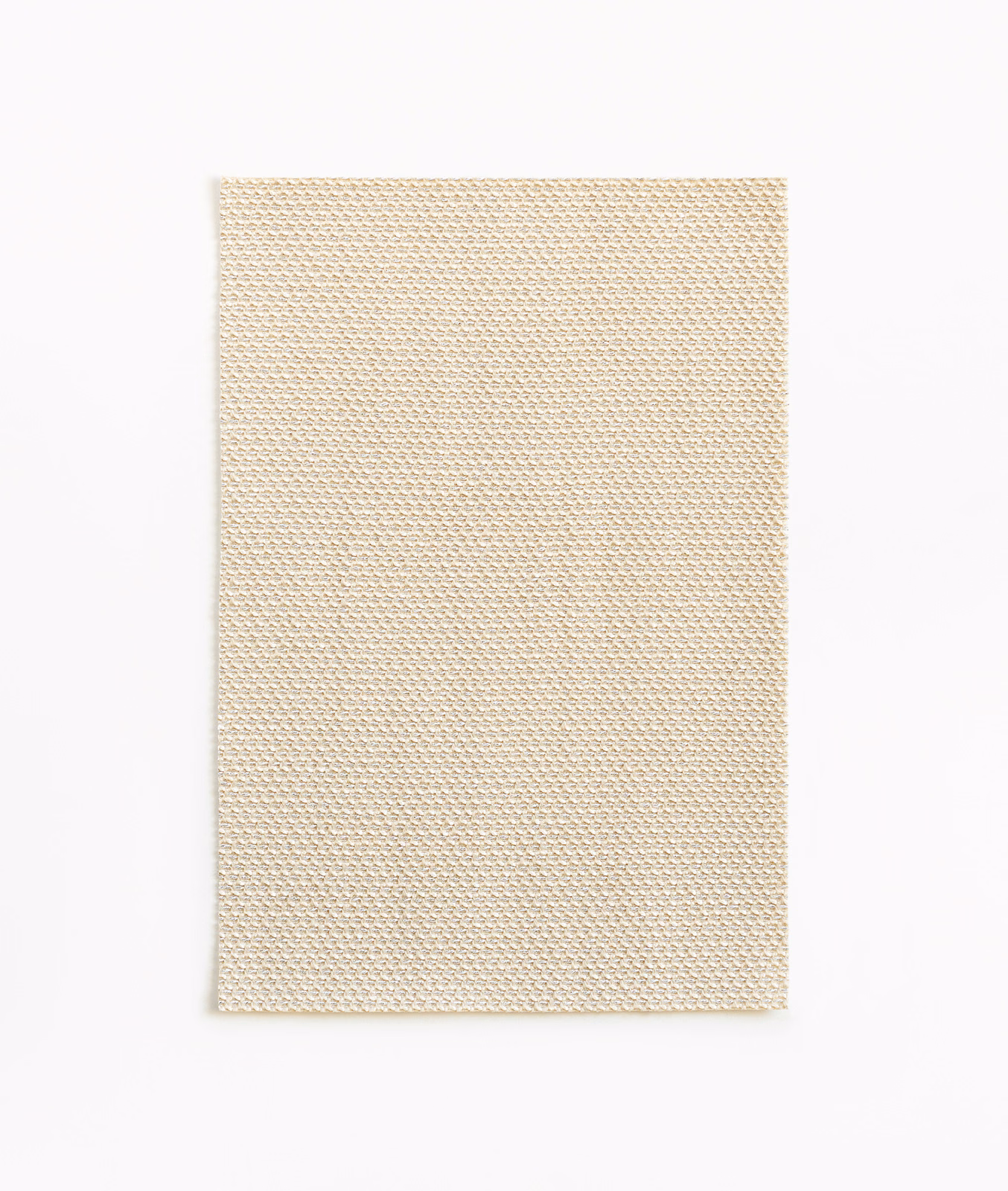 Pale sandy-beige swatch with a dense, fine repeating woven texture