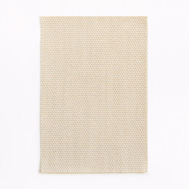 Pale sandy-beige swatch with a dense, fine repeating woven texture