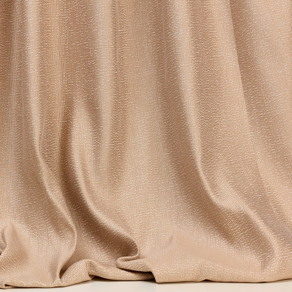 Warm sandy-beige woven fabric with fine texture and softly folded drape