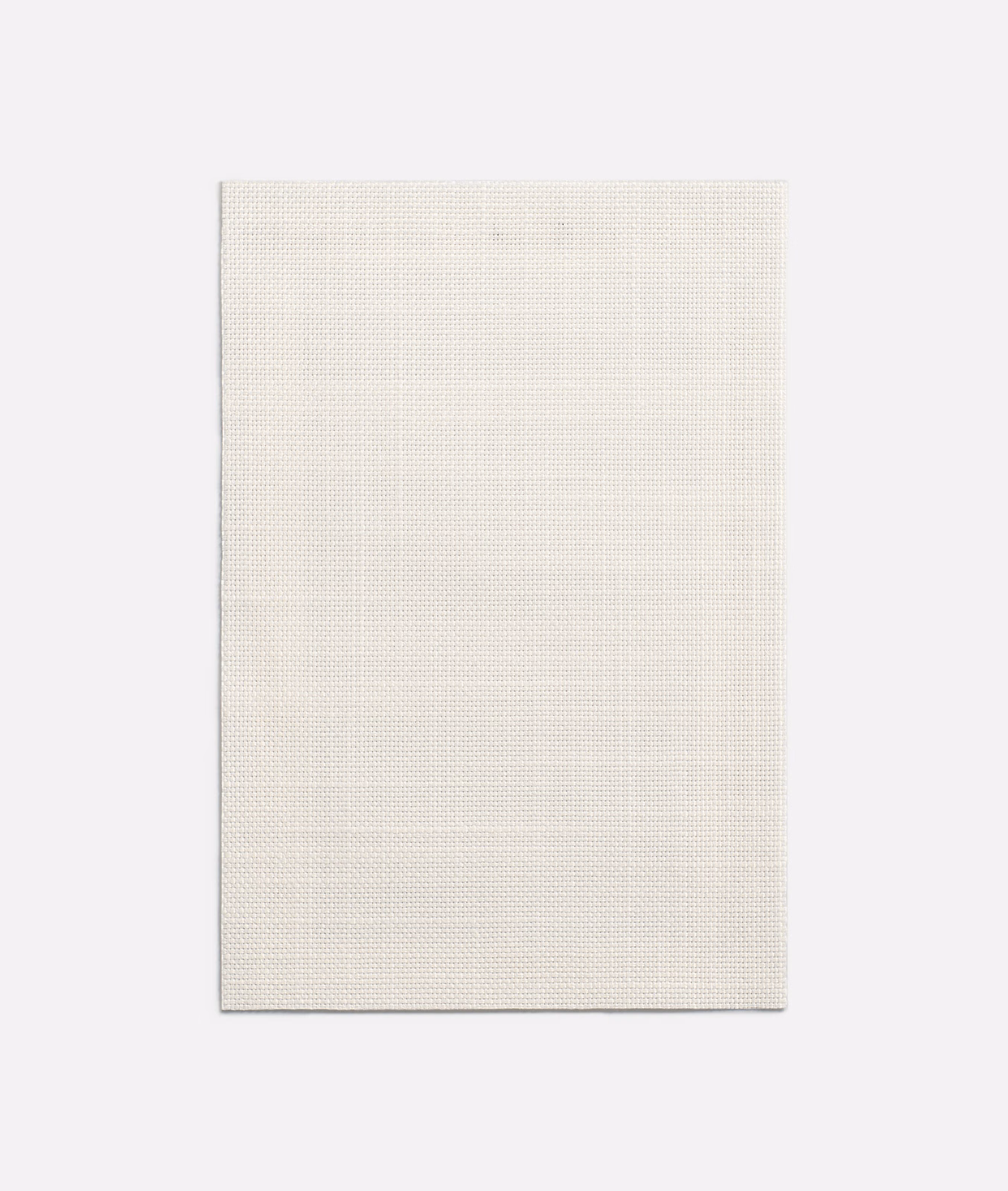 Pale ivory fabric showing a fine, even woven grid and softly textured surface