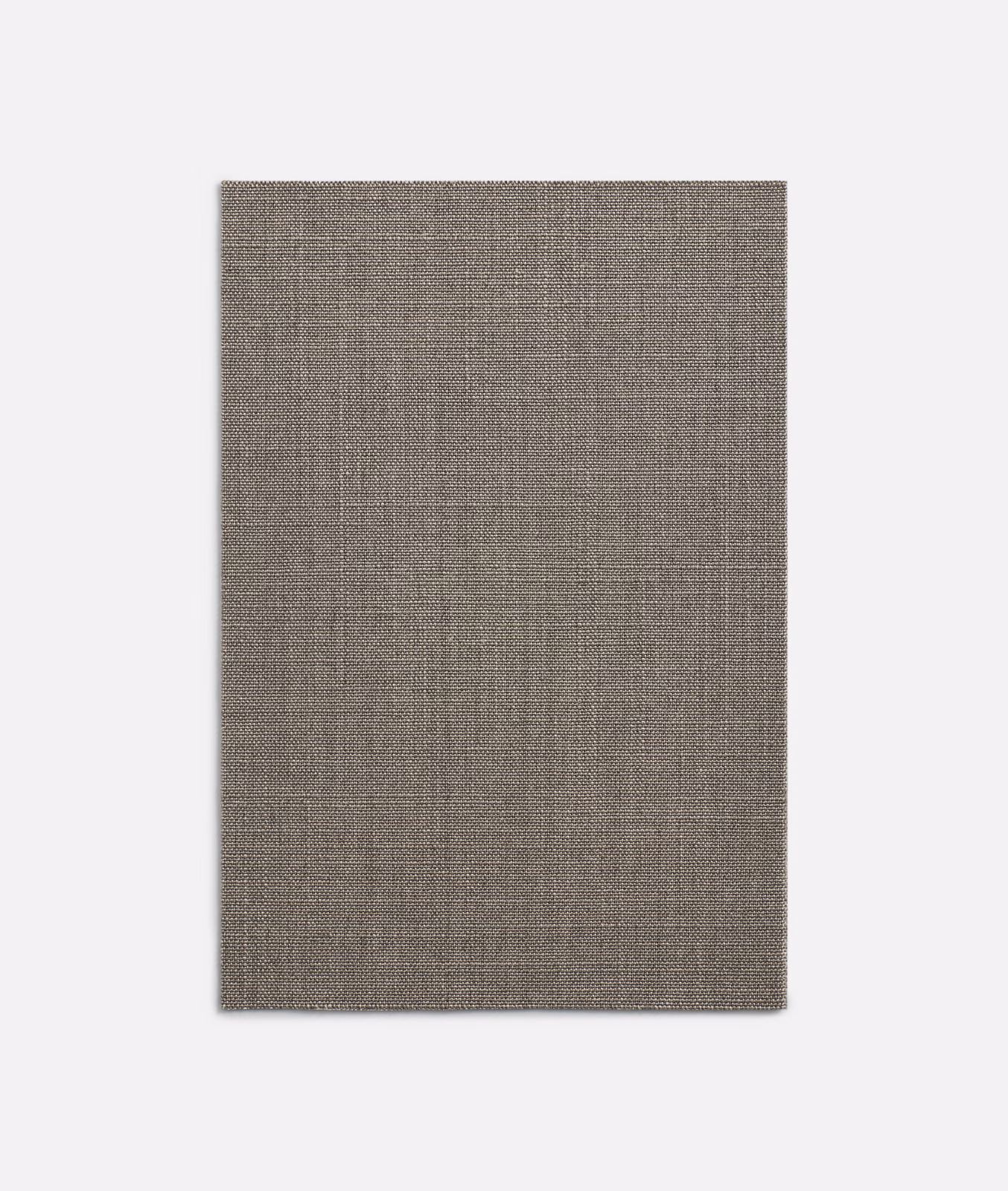 Close-up of muted grey taupe fabric with a fine compact plain weave
