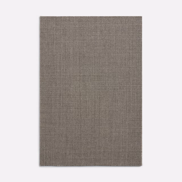 Close-up of muted grey taupe fabric with a fine compact plain weave