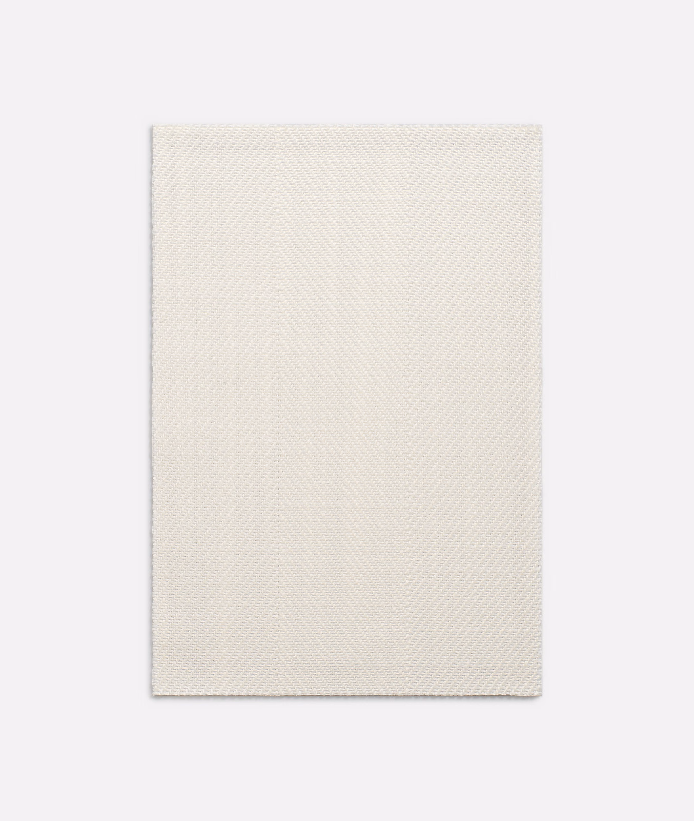 Warm ivory fabric with a fine, closely spaced chevron weave
