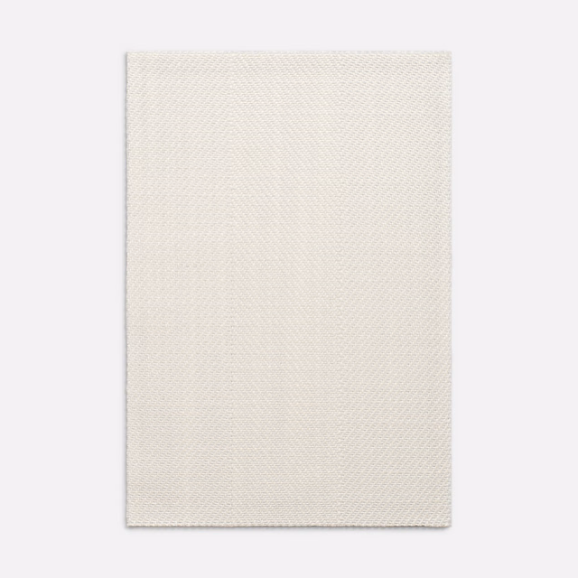 Warm ivory fabric with a fine, closely spaced chevron weave