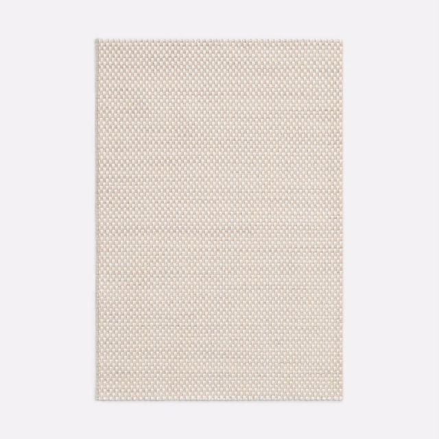 Pale sandy-beige textile with a tiny, even raised woven texture