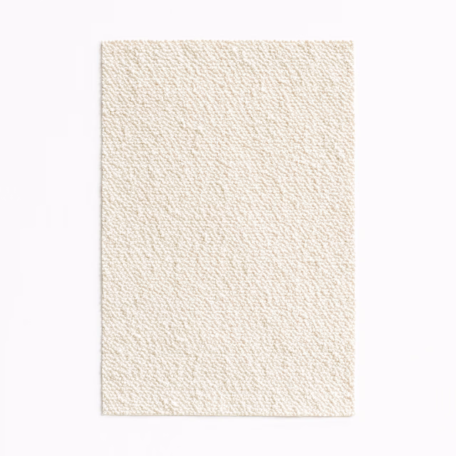 Pale petit-lait cream textile with a fine, irregular nubby weave