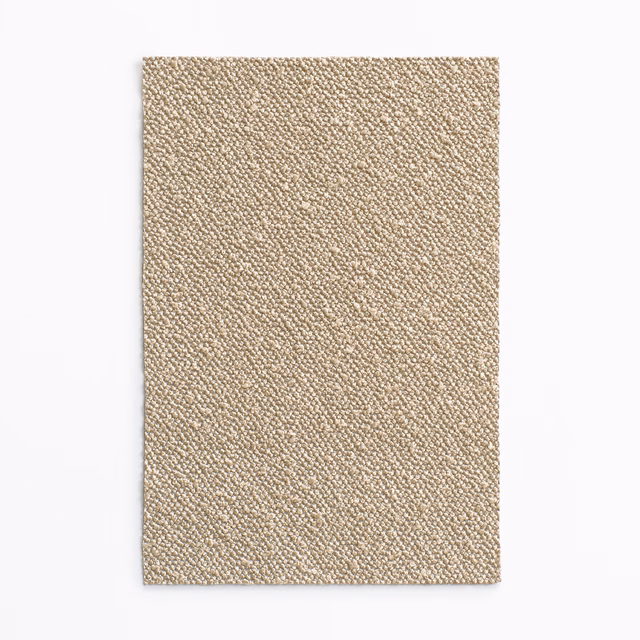 Warm sand-beige Lupo swatch with dense, fine nubby texture and subtle tonal flecks