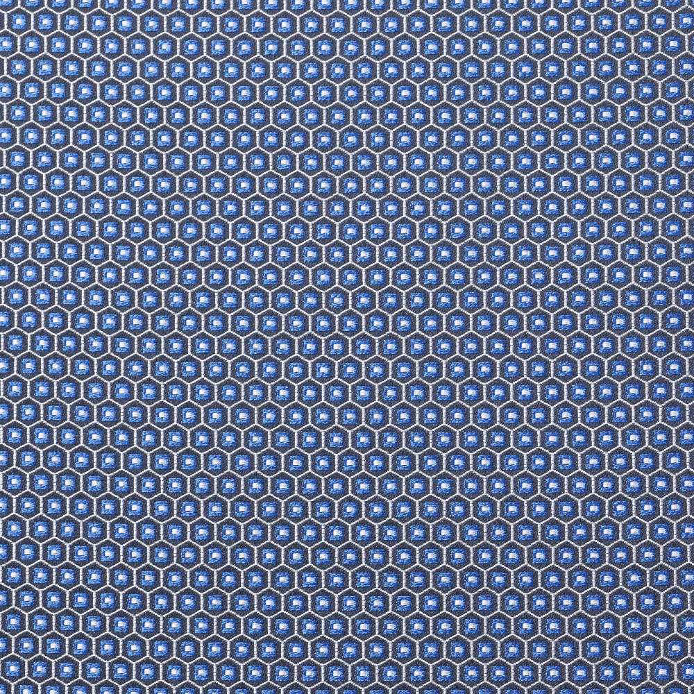Electric blue textile with tiny navy-outlined hexagons and white central flecks