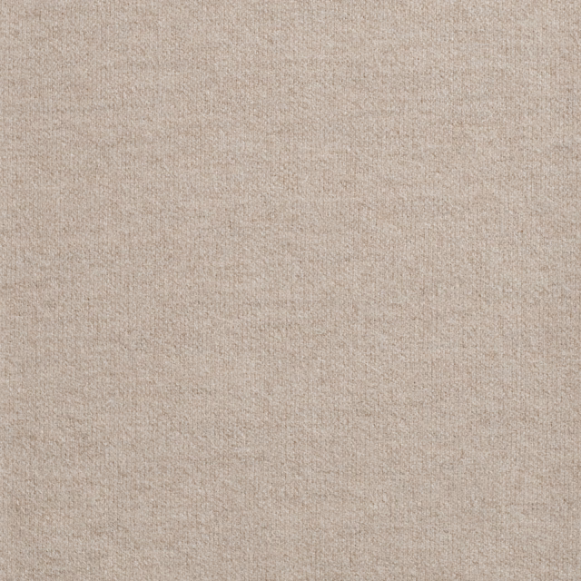 Close-up of warm sandy-beige fabric with a fine, softly textured plain weave
