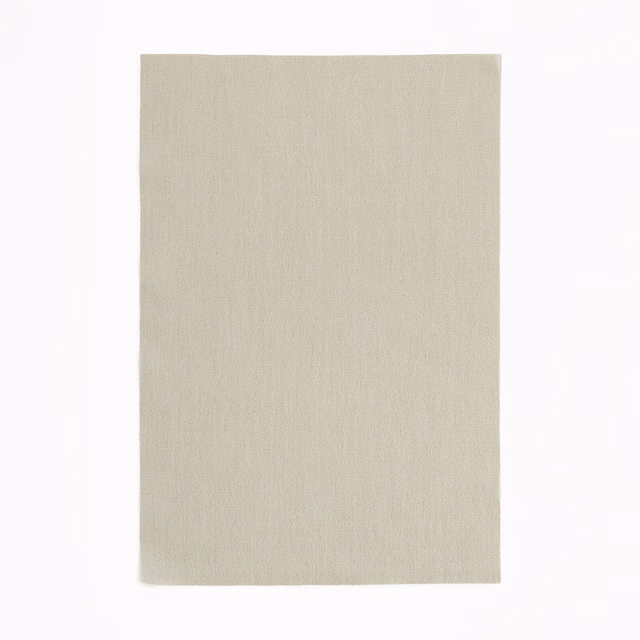 Pale silver-greige fabric swatch with delicate vertical woven texture