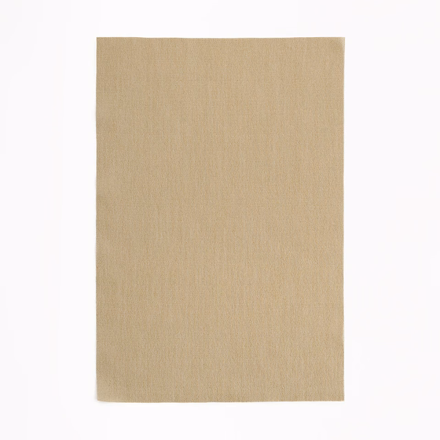 Warm golden beige woven fabric with subtle vertical grain and softly textured surface
