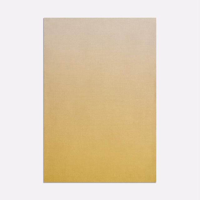 Pale beige to warm mustard yellow ombré fabric with a fine woven texture