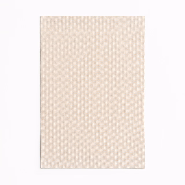 Pale blush-beige textile showing a fine, even plain weave