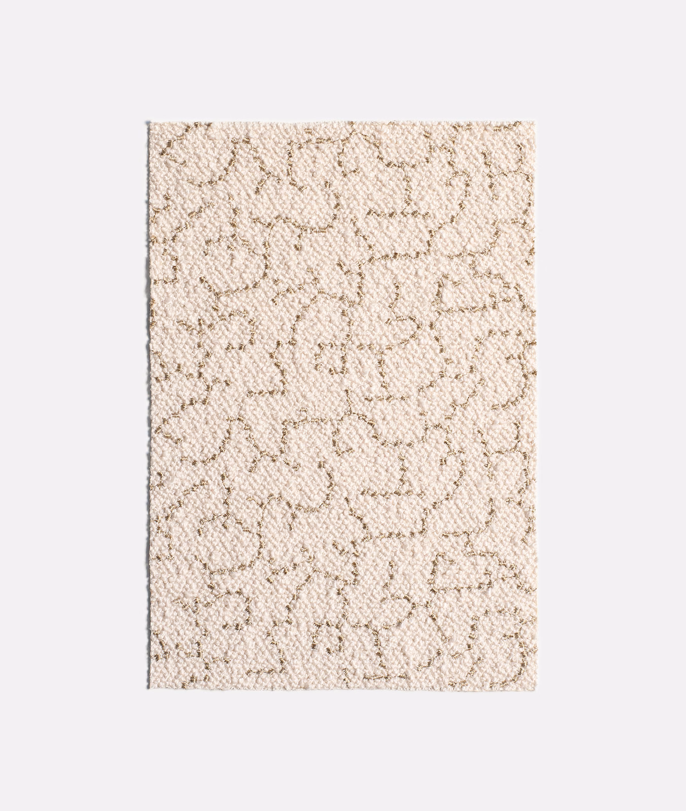 Cream woven swatch with taupe looping lines and a nubby, flecked texture