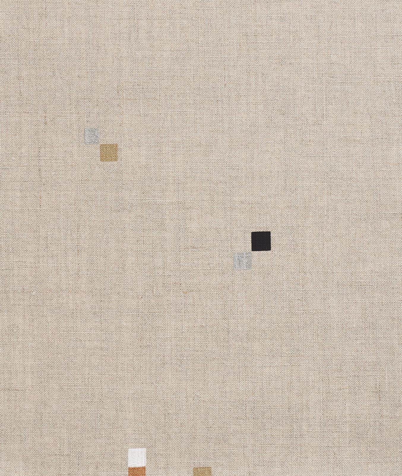 Warm greige woven textile with tiny black, ochre, blue and white geometric squares