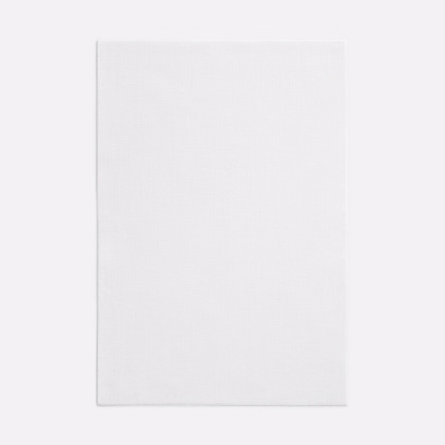 Near-white Dedar fabric swatch with a barely visible fine woven grain
