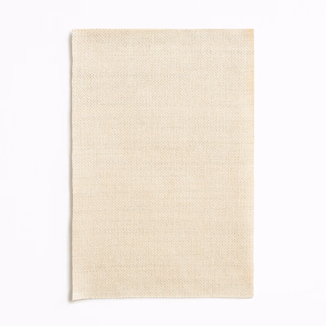 Light warm sand fabric swatch with fine, subtly textured woven surface