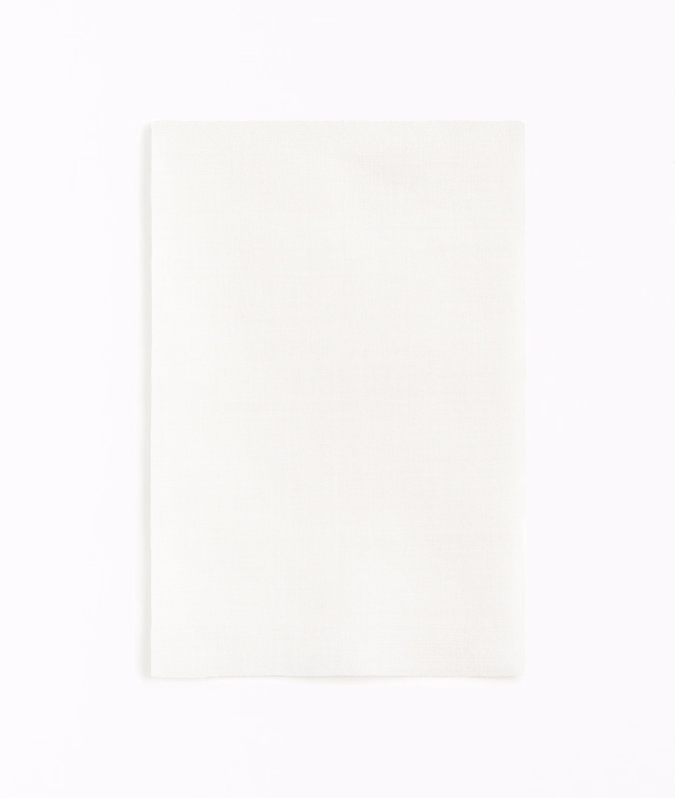 Soft ivory-white fabric swatch with a barely visible fine woven grain