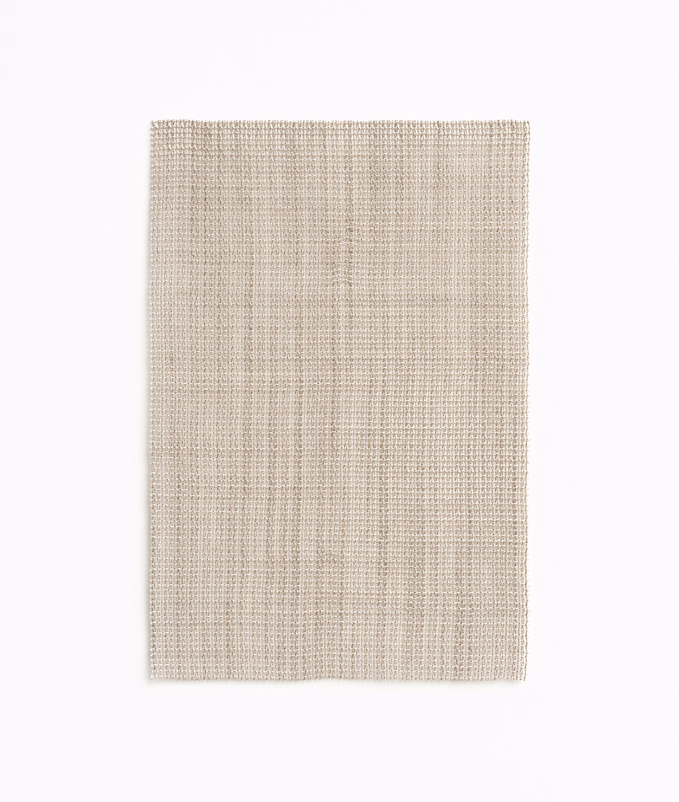 Pale warm greige woven swatch with fine vertical striations and soft texture