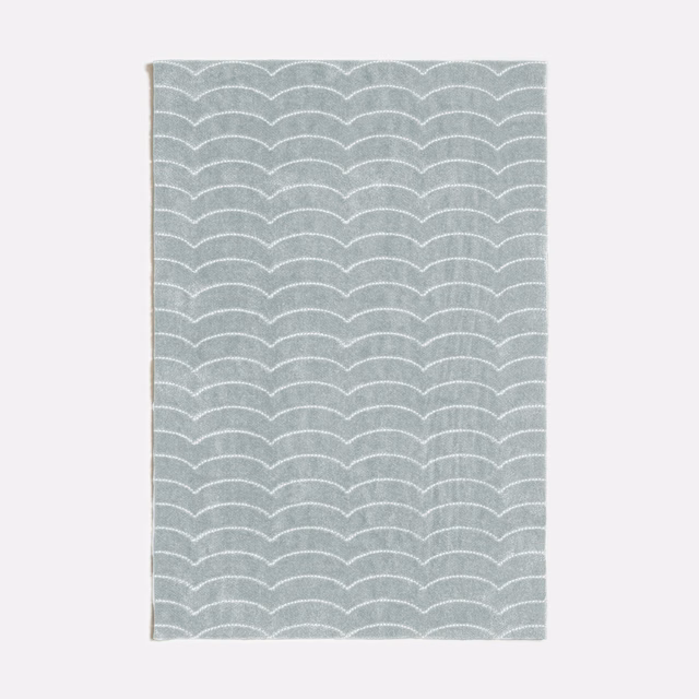 Celadon grey-green woven swatch with fine white scalloped wave rows