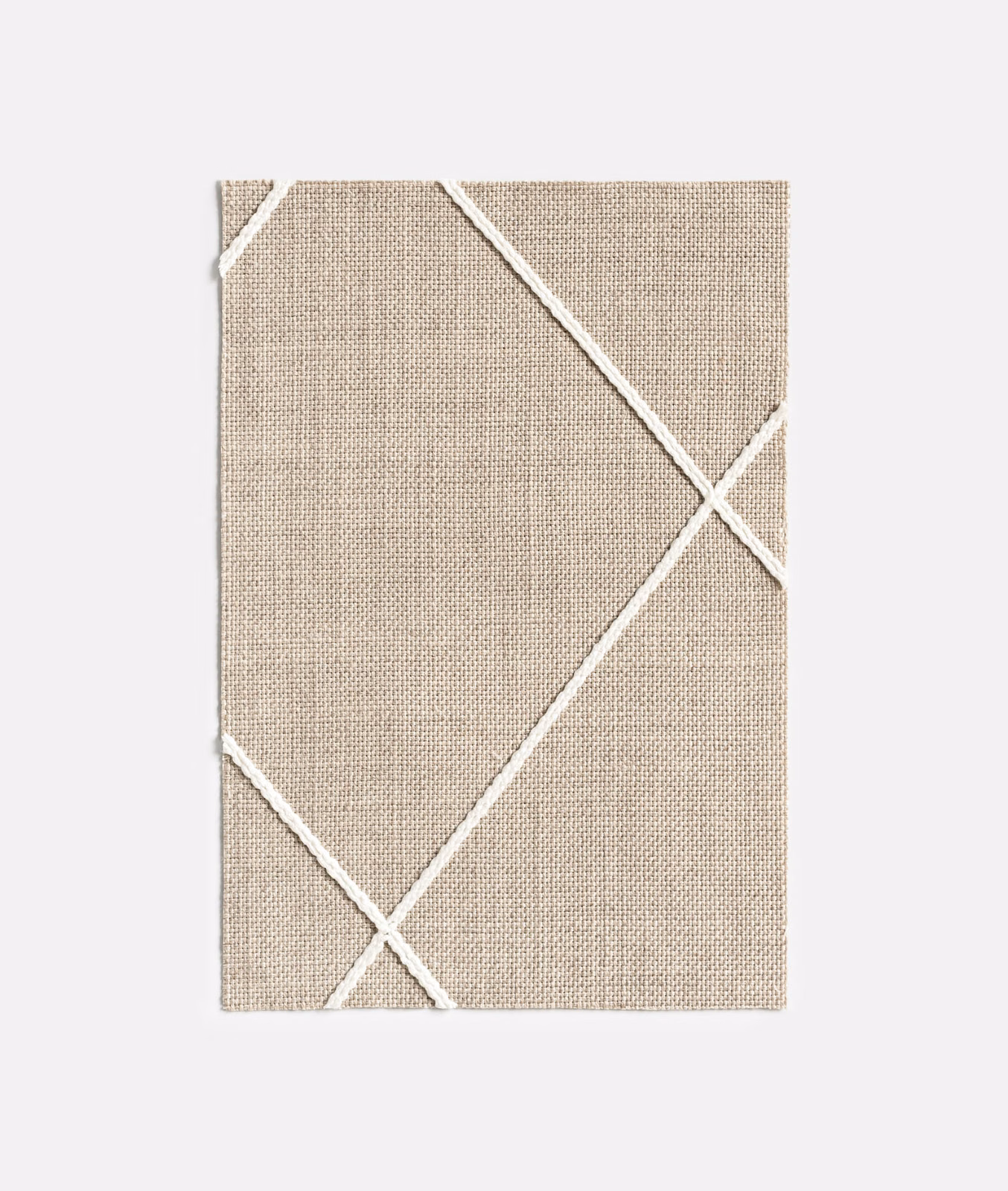 Warm taupe woven swatch with intersecting ivory diagonal lines forming large geometric squares