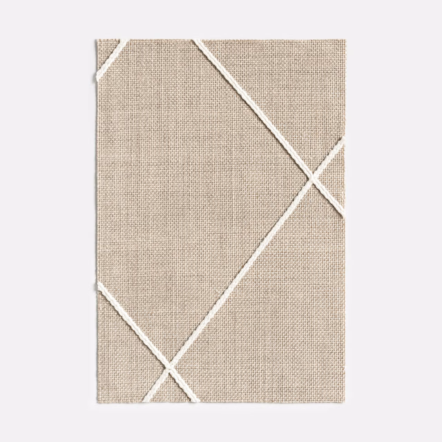 Warm taupe woven swatch with intersecting ivory diagonal lines forming large geometric squares