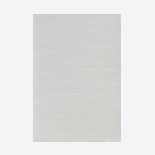 Pale cool grey-green fabric with fine horizontal weave and subtle light-catching flecks