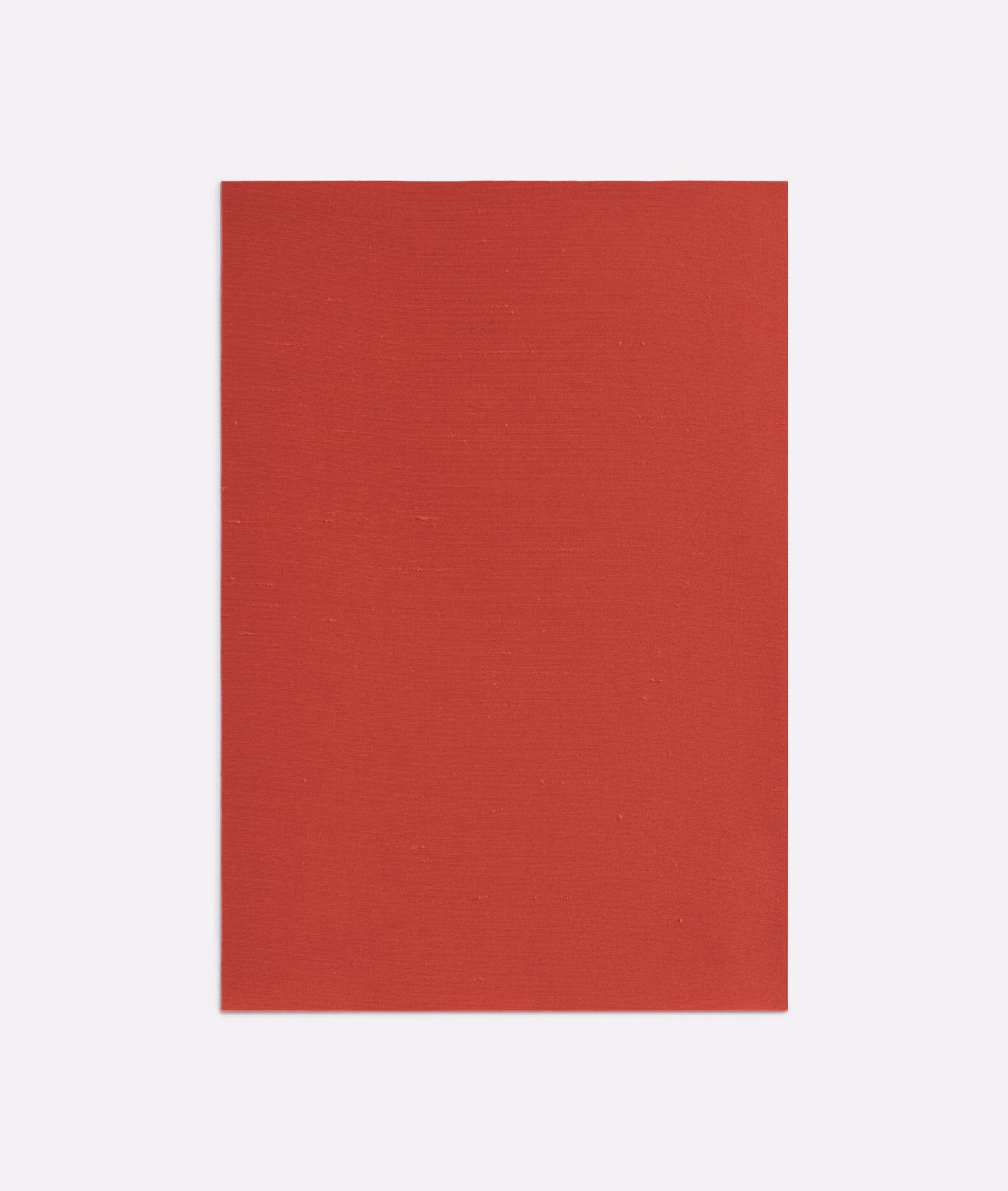 Deep geranium-red plain fabric swatch with a fine horizontal woven texture